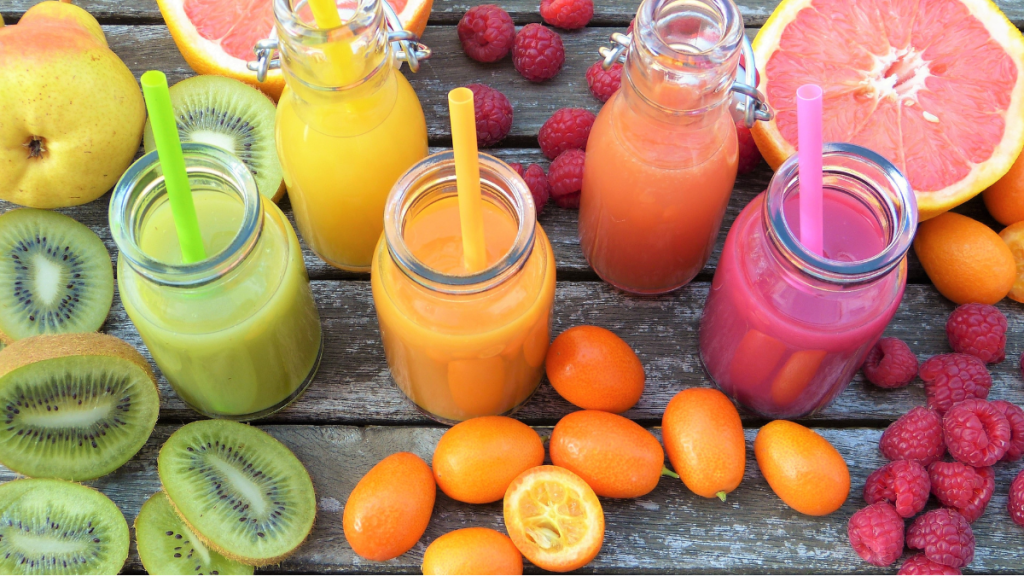 how to juice without a juicer - assortment of fresh juices and fruits