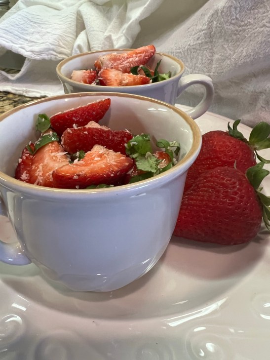 simple strawberry salad served in teacups